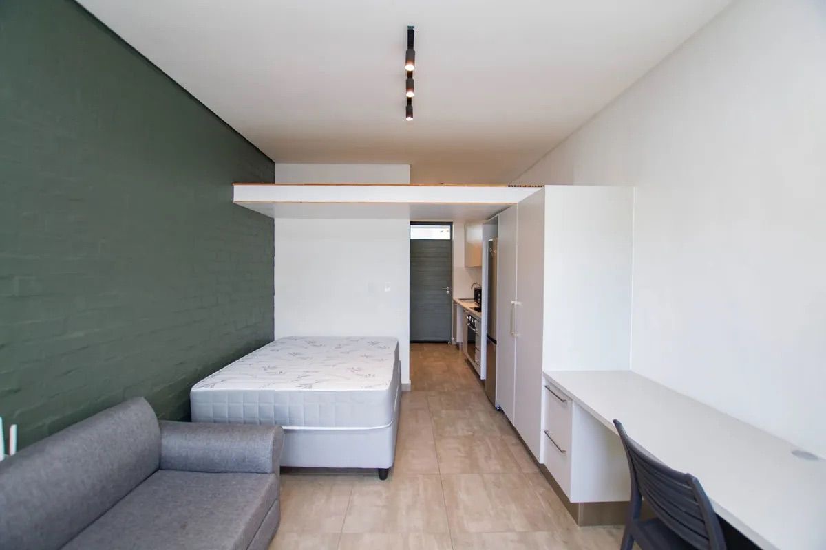 Freshly cleaned studio apartment with a spotless living and sleeping area