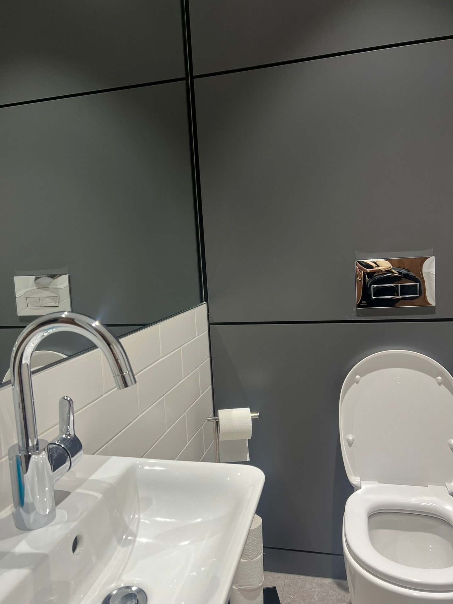 Spotless modern washroom with polished sink and fittings